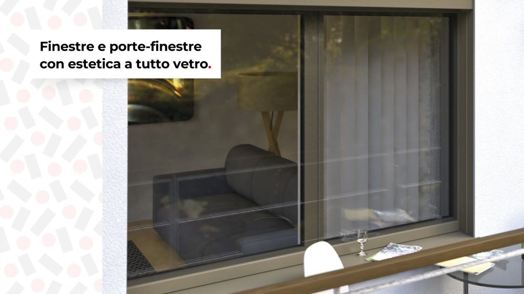 Infissi minimal a tutto vetro con finestra scorrevole dal profilo sottile, soluzione moderna che unisce design essenziale e massima luminosità.